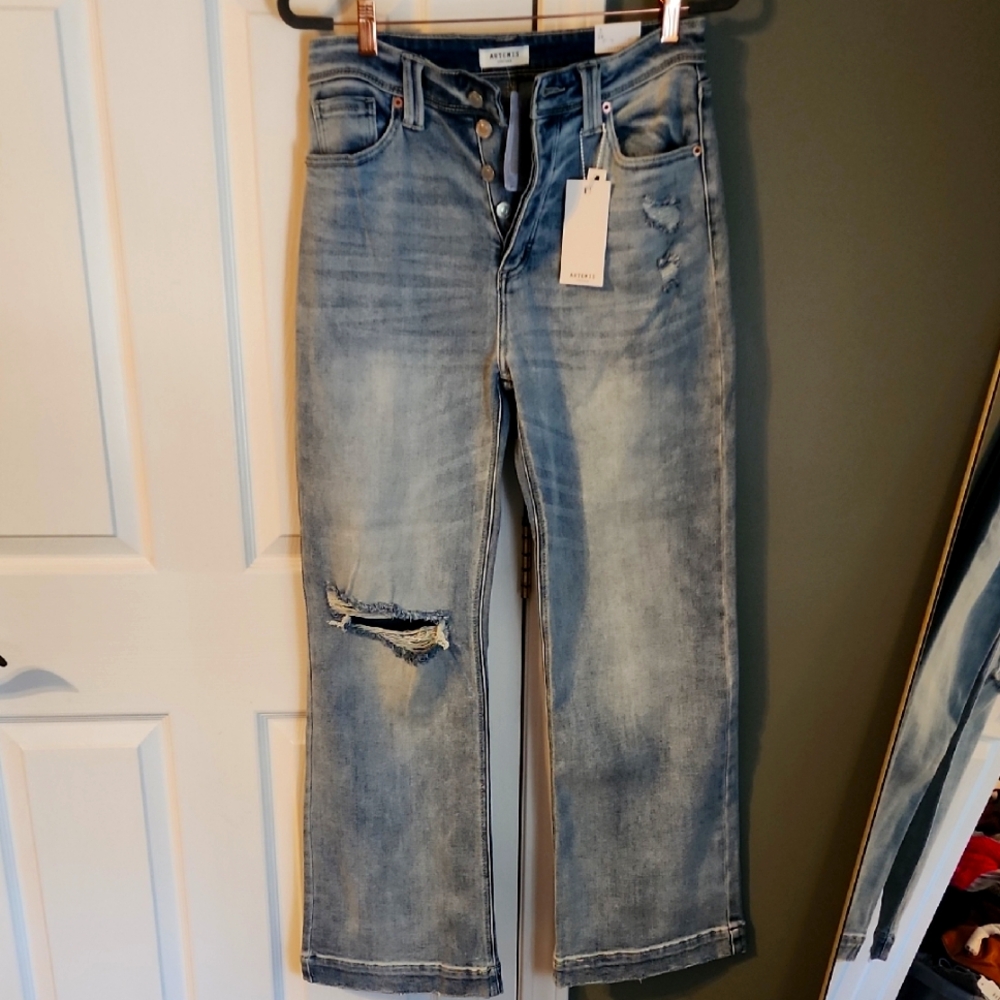 Distressed Blue Denim Jeans